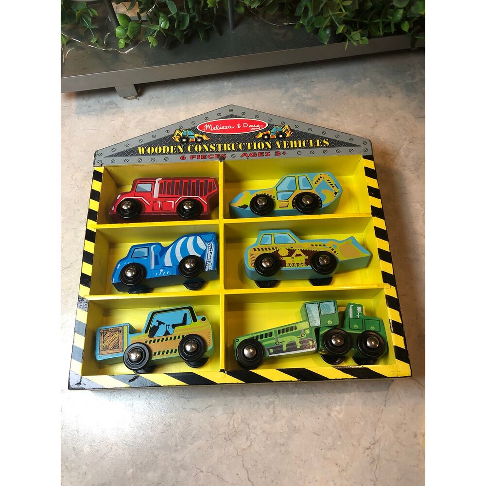 Melissa and Doug 6 piece Wooden Construction Vehicles and parking Garage